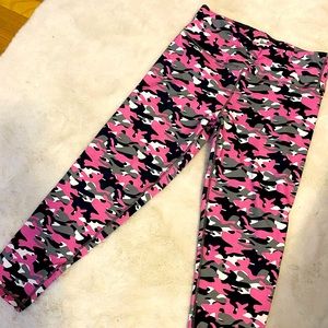 90 degree. Pink camo leggings.